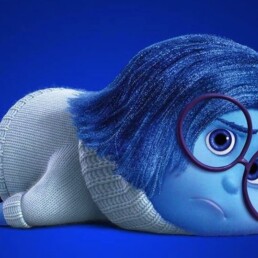Pixar Animation Studios Sadness movie inside out lying down sad
