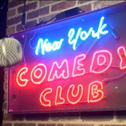 new york comedy club banner with mic